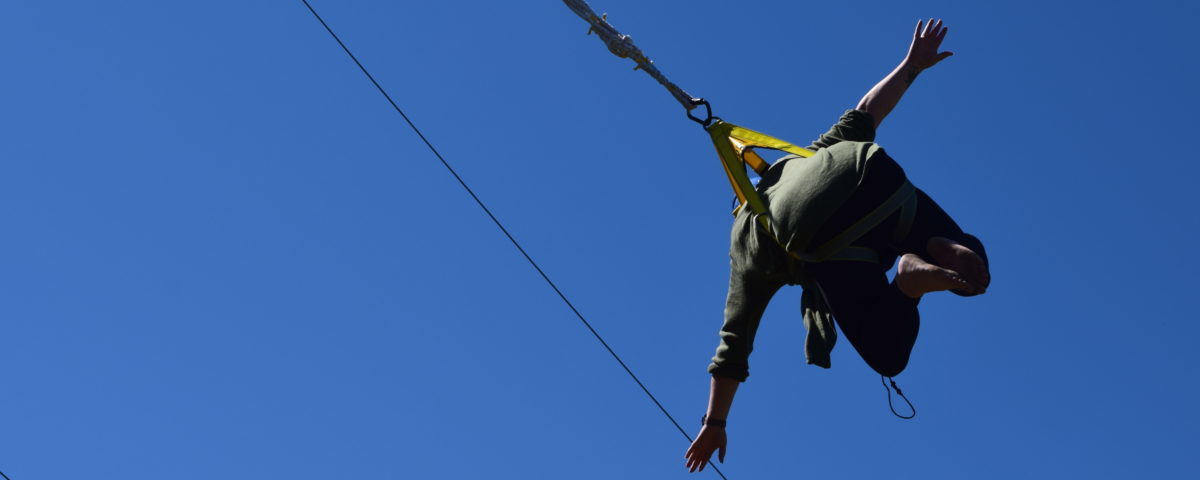 staff member swinging during big swing event