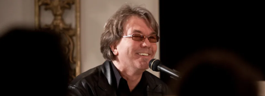 John McAndrew playing piano